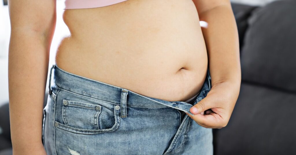 冬太りで突き出たおなか